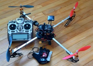 Quadcopter, radio transmitter and glove
